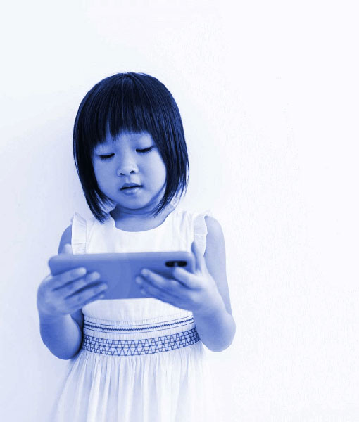 Young girl holding a smartphone